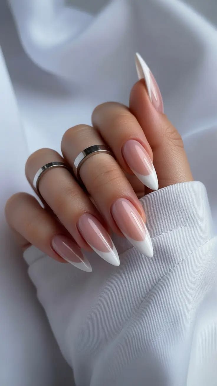 Soft makeup and French manicure detail